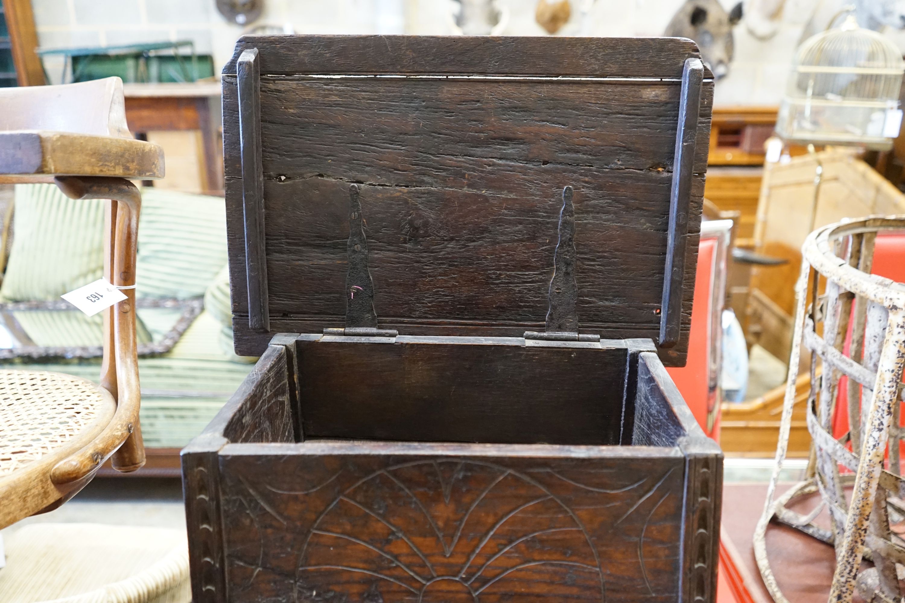 A 17th century style oak box on stand, width 48cm depth 33cm height 55cm